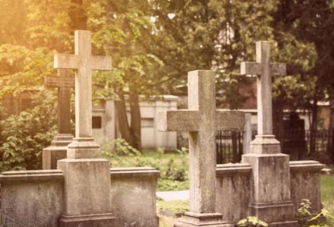 group of stony crosses at a cemetery